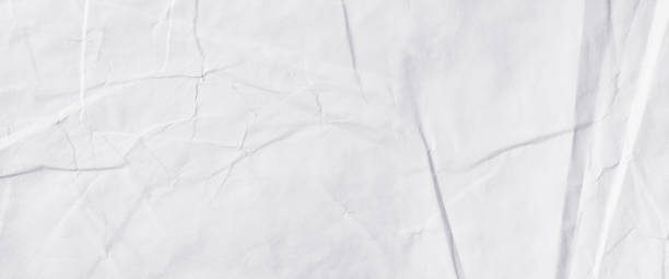 istock Creative background with scattered overlay of crumpled papers. 1207268183
