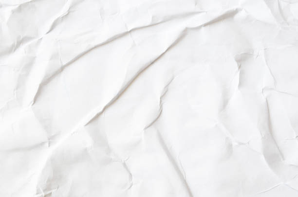 istock Creative background with scattered overlay of crumpled papers. 1207268977