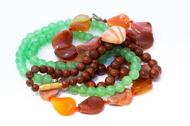 istock Jasper, agate and nephritis beads isolated on white background 1207271854