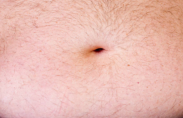 Man's Tummy with Belly Button stock photo