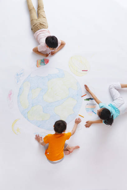 istock The kindergarten children to draw 1207274271