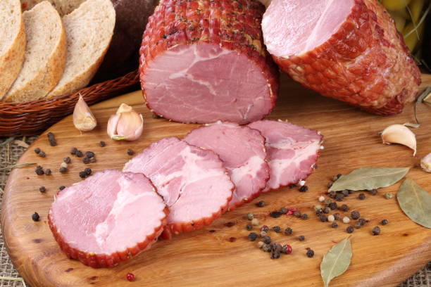 istock Pork bacon on a wooden table 1207274616