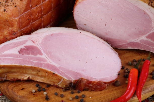 istock Pork bacon on a wooden table 1207274650
