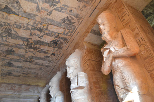 istock Huge Statue inside the Abu Simbel with visitor walking around. 1207276061