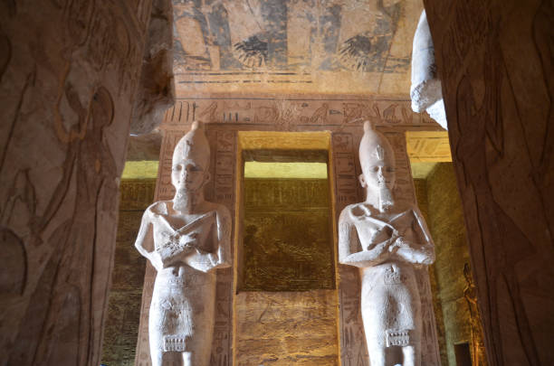 istock Huge Statue inside the Abu Simbel with visitor walking around. 1207276534