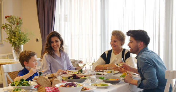 istock Multi-generation family having a vegan dinner 1207276744