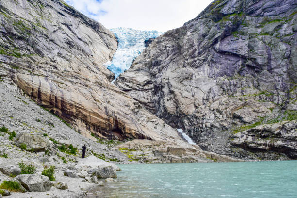 istock The Brikdalsbreen glacier in Norway. The  Briksdalsbrevatnet lake with clear water. 1207277419