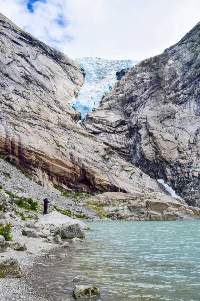 istock The Brikdalsbreen glacier in Norway. The  Briksdalsbrevatnet lake with clear water. 1207277478