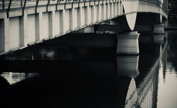 istock Traditional concrete bridge on a river unique photo 1207279378