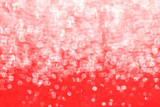 istock Background with light red gradient sequin texture. Glitter background for Holiday and party banner 1207279454