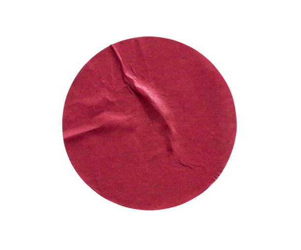 istock Blank red round adhesive paper sticker label isolated on white background 1207279858