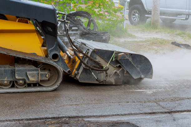 istock Removing old asphalt from a street surface road milling machine 1207280357