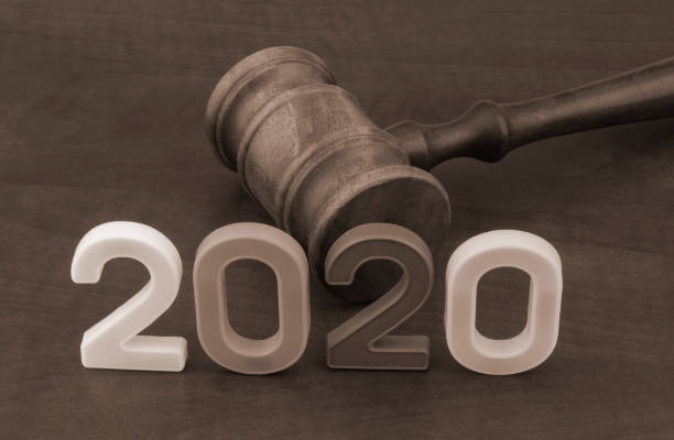 istock Judge gavel and numbers 2020 on table. 1207281589