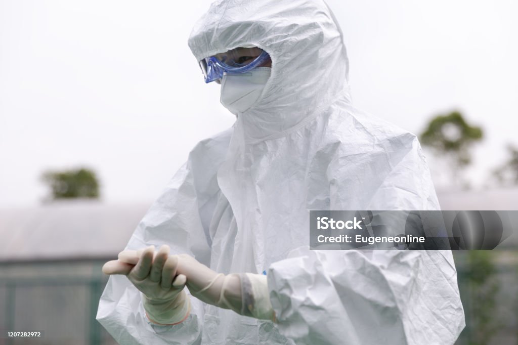 CDC staff with Protective Workwear. Protective Workwear Stock Photo