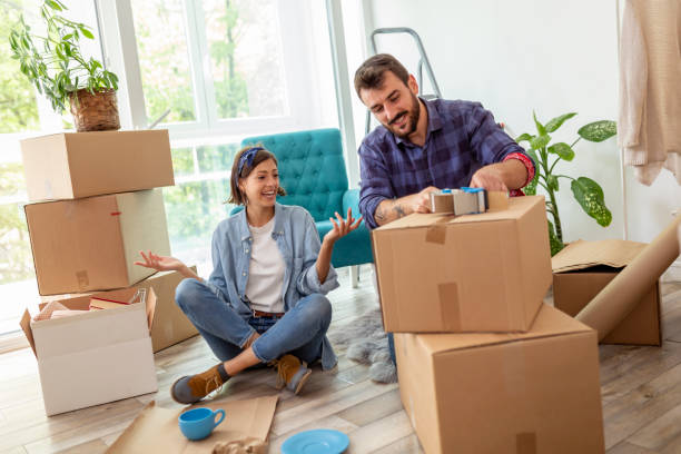 istock Couple moving into new home 1207283321