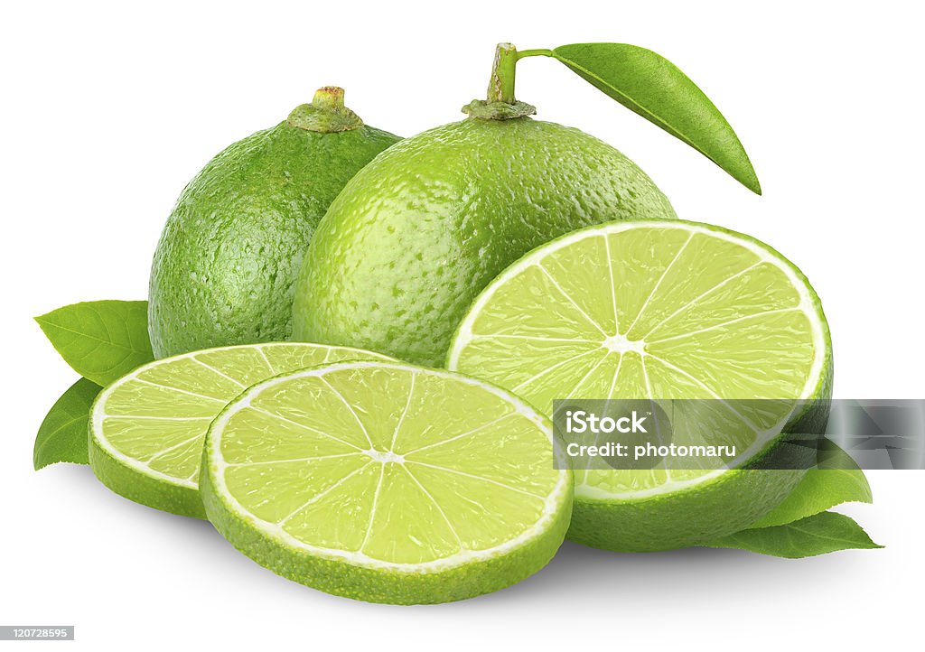 Fresh limes Fresh limes with leaves isolated on white. Citrus Fruit Stock Photo