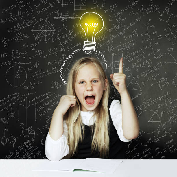 istock Child girl thumbs up and lightbulb. Concept Ideas and projects 1207291048