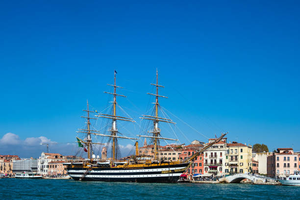 istock Sailing ship and buildings in Venice, Italy 1207291413