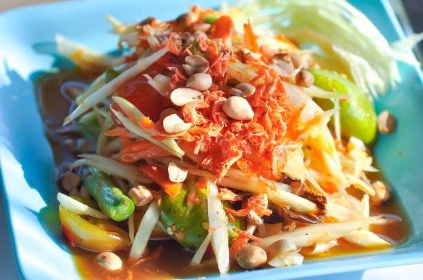 istock som tam ,spicy salad or Thai food 1207292844