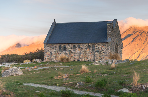 Beautiful morning at Church of The Good Shepherd and Lake Tekapo, New Zealand .The famaus tourist attraction of new zealand