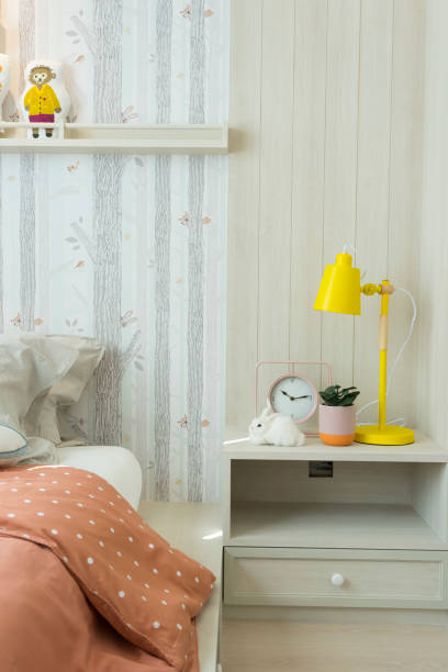 istock Cute animal doll on bed in kid bedroom. 1207294861