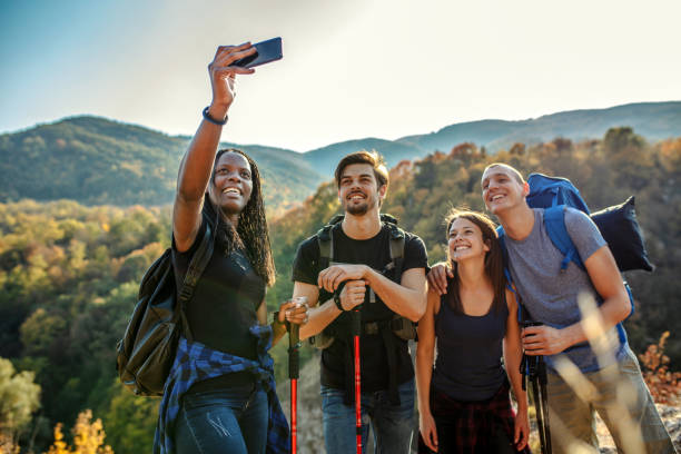 istock Friends take selfie during hiking at summer time 1207296619