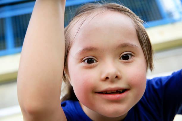 istock Little girl have fun on the stadium 1207297150
