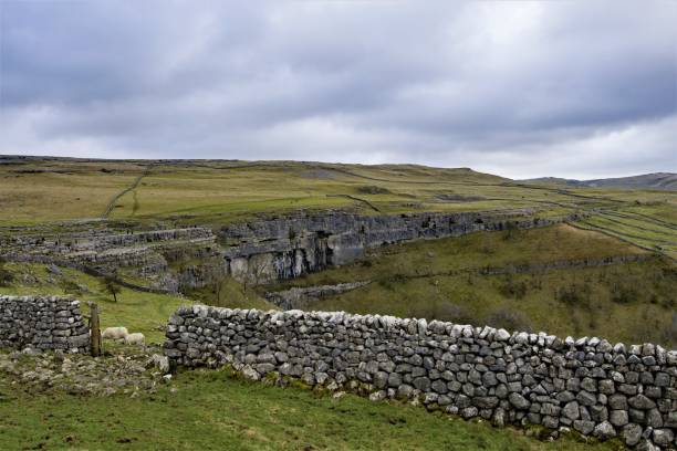 istock Stone wall at Malham Cove, Malhamdale, Yorkshire Dales. 1207298453