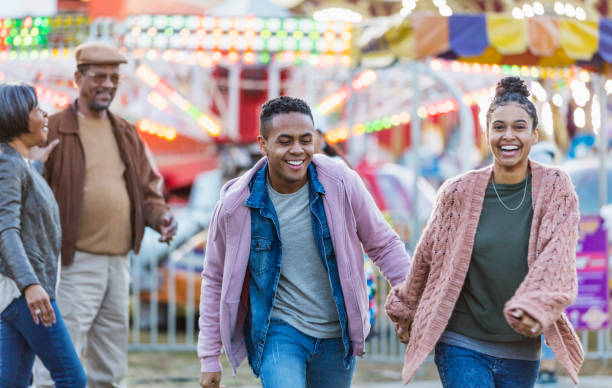 istock Young couple at carnival 1207299678