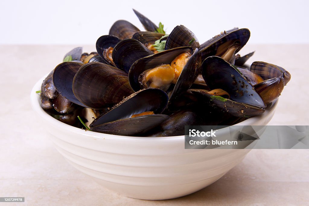 Moules. - Photo de Filet mignon et homard libre de droits