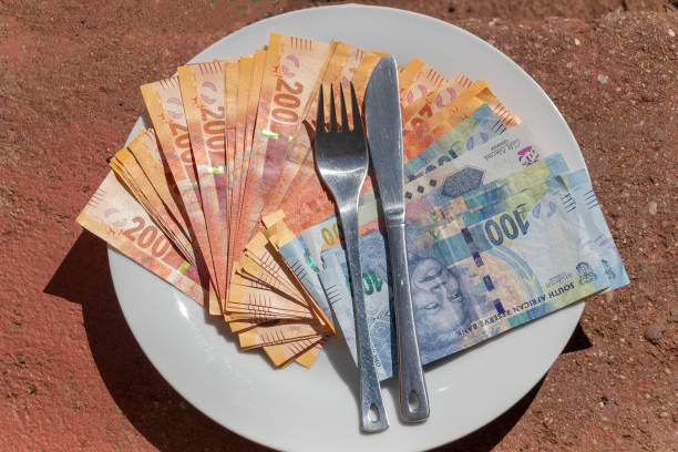 istock A close up view of One and Two Hundred Rand notes 1207299851
