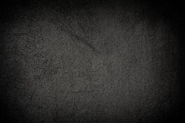 istock Black rough concrete wall texture background. Polished concrete grunge surface. 1207300117