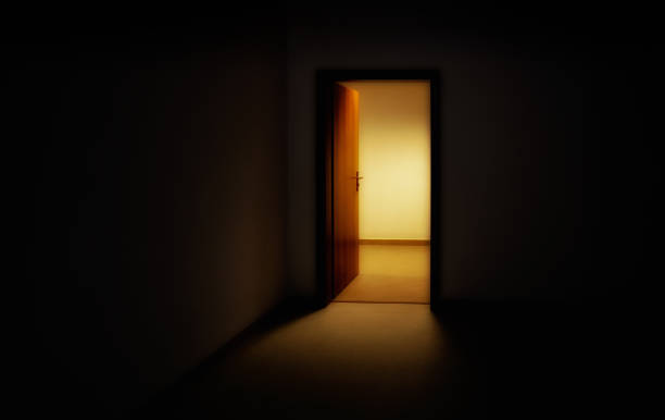 Light entering through open doors in room stock photo
