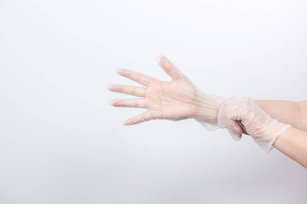 istock A pair of gloved hands 1207304491