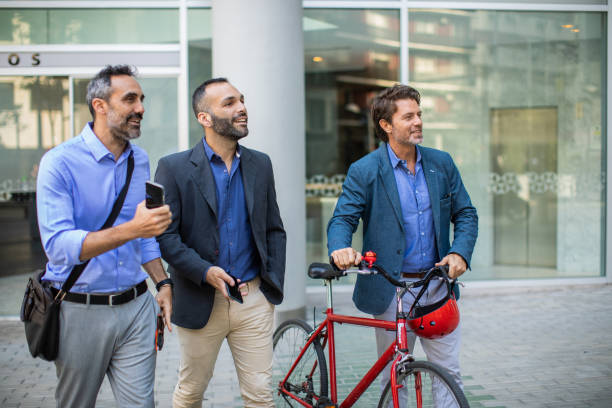 Coworkers after work in front of office building