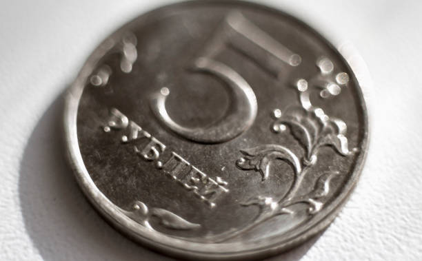 istock coin in five Russian rubles close-up on a white background 1207307703