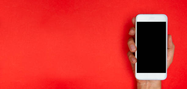 istock Woman Holding Black Screen Smart Phone 1207307877