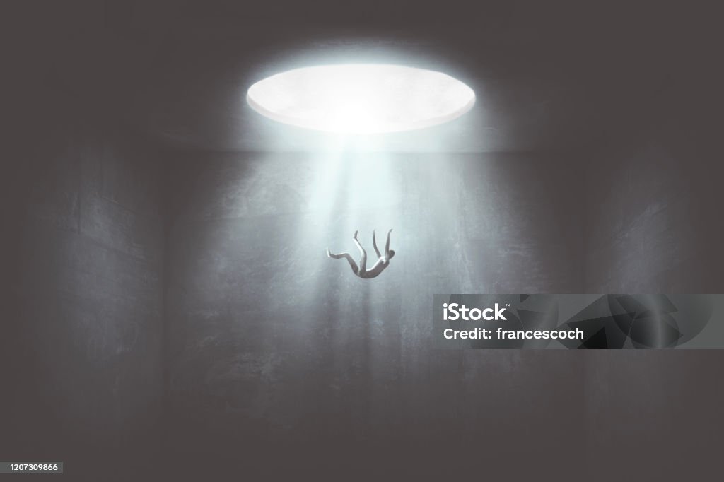 man falling down from a hole of light, surreal concept man falling in the void from big hole surreal concept Falling Stock Photo
