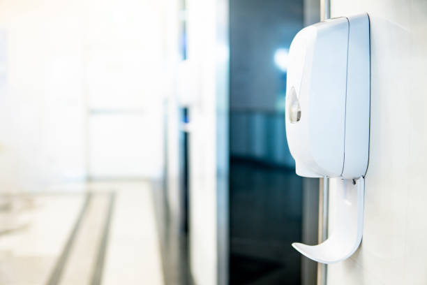 istock Automatic alcohol dispenser in hospital 1207312466