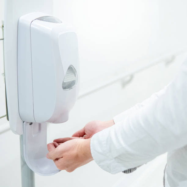 istock Automatic alcohol dispenser in hospital 1207312470