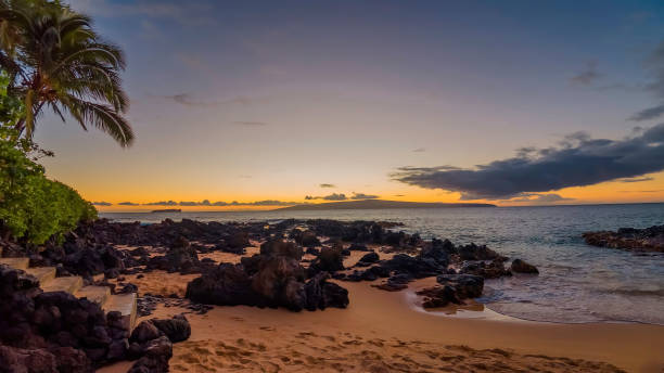 istock Stone sea shore at sunset 1207313872