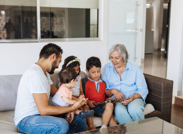 istock Latino multi-generation family at home 1207315304