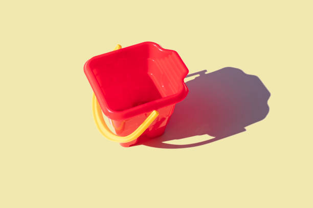 Children beach toy isolated on yellow background