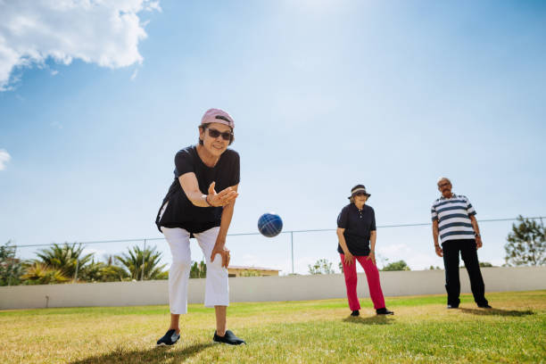 istock Healthy senior people playing boules 1207317296