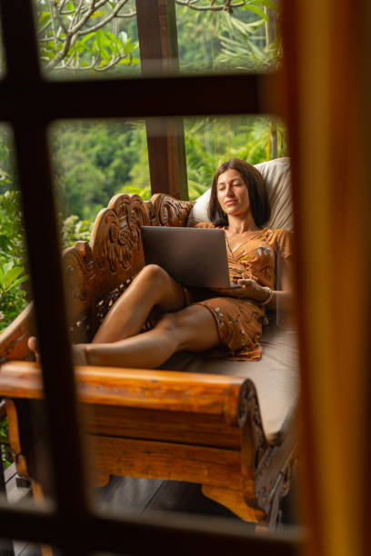 istock Cute young woman working at her project 1207317363