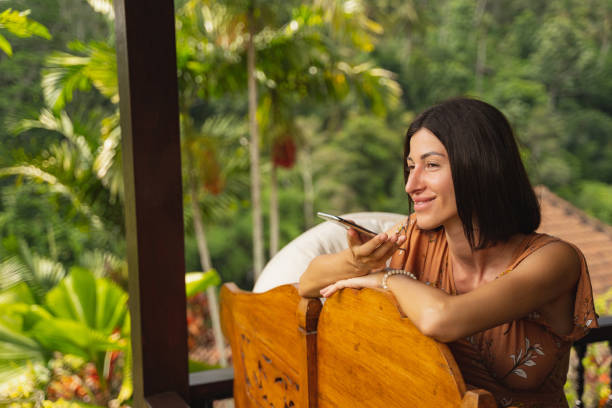 istock Positive delighted brunette girl smiling during conversation 1207317462