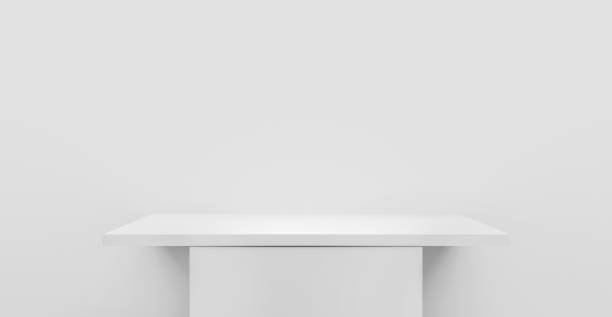 istock 3D rendering of empty shelf table on white wall or empty pedestal for mockup 1207317825