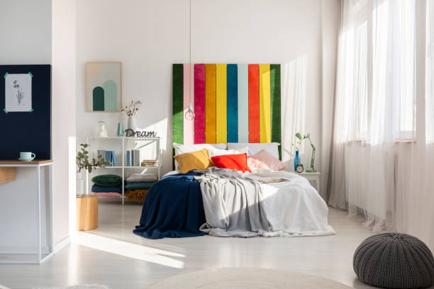 colorful bedroom interior with rainbow colored bedhead - headboard imagens e fotografias de stock