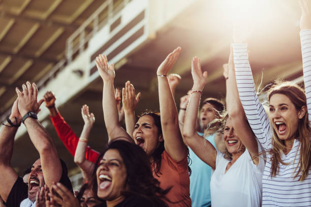 soccer fans celebrate their team victory - sport crowd fan stadium imagens e fotografias de stock