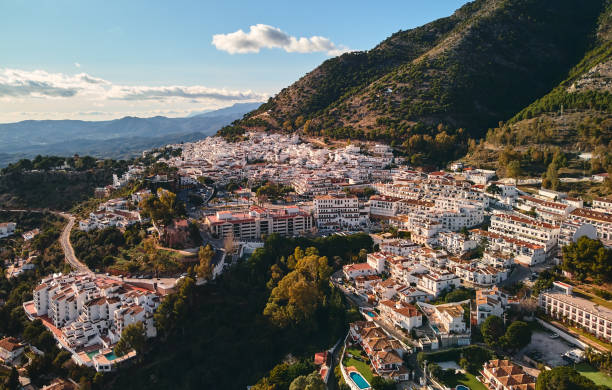 istock Aerial photo distant view charming Mijas pueblo 1207323024